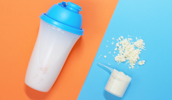 picture of meal replacement shake powder and a shaker bottle