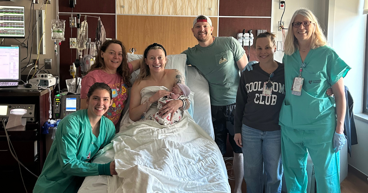 Midwife Alyssa Fischer, daughter Rowyn and her birth support team