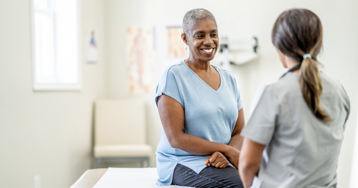 Older woman talking to her doctor