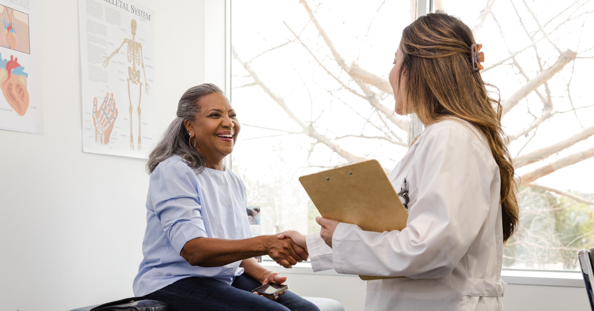 Older woman talking to her doctor