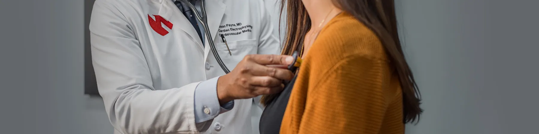 a Nebraska Medicine cardiology provider with a stethoscope.
