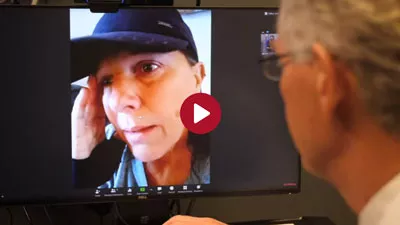Nebraska Medicine doctor talks with a patient via telemedicine, using zoom technology