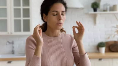 picture of a woman using breathing exercises