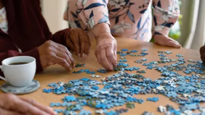 picture of women putting together a jigsaw puzzle