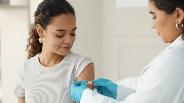 Woman getting vaccine