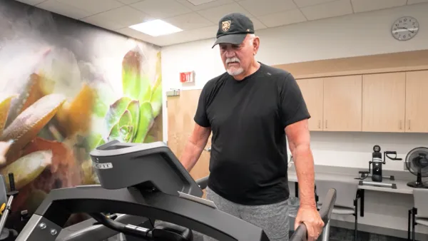 Patient Rich Stanko walking on treadmill in Nebraska Medicine clinic