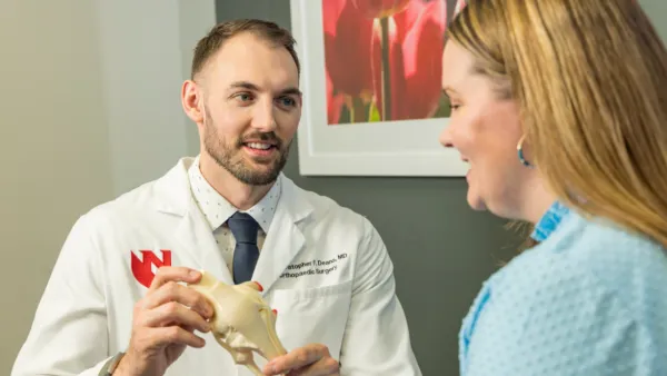 Christopher Deans, MD with patient