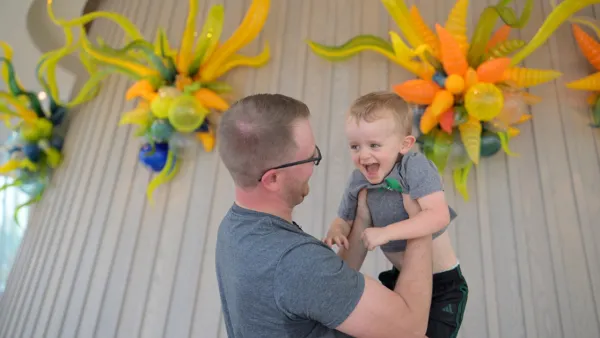 Dan Petersen holding son Jack