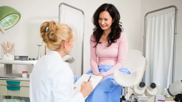 Woman talking to her gynecologist