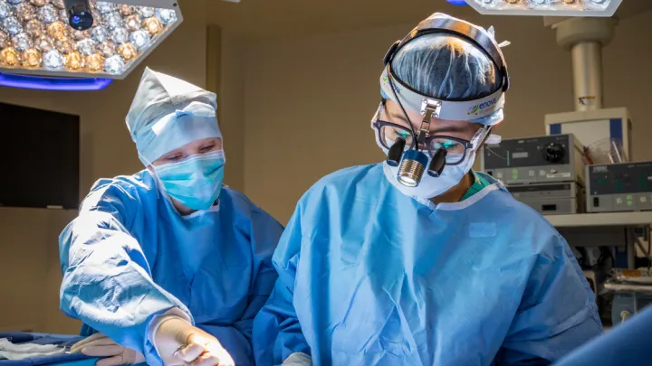 Shannon Wong, MD, works with a member of the care team