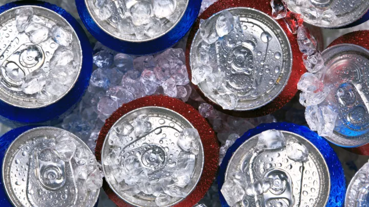 Cans of pop in ice