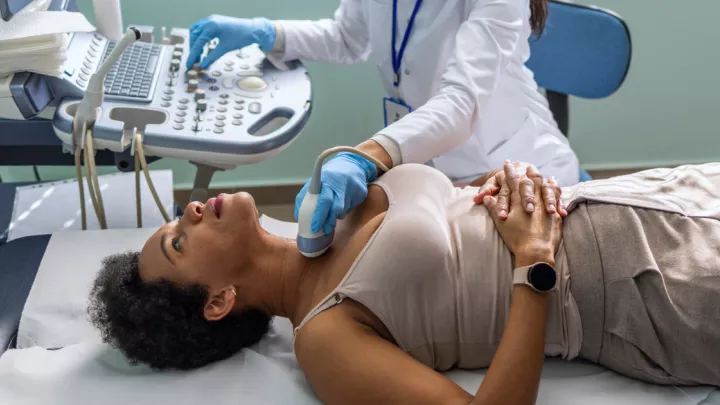 Woman getting ultrasound on her neck