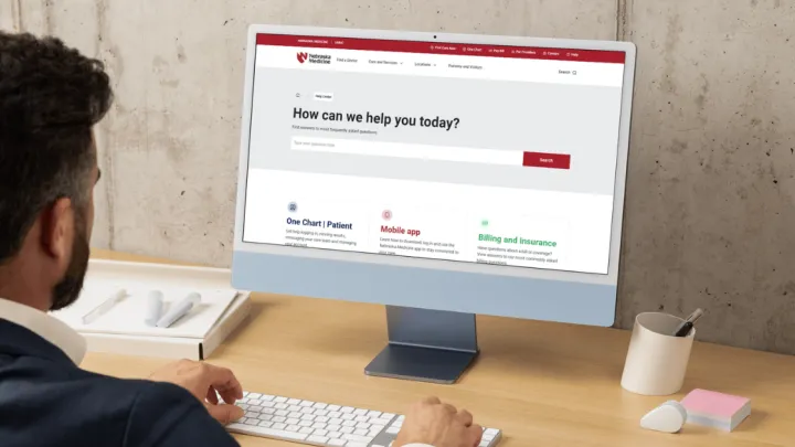 Man looking at Nebraska Medicine Help Center website