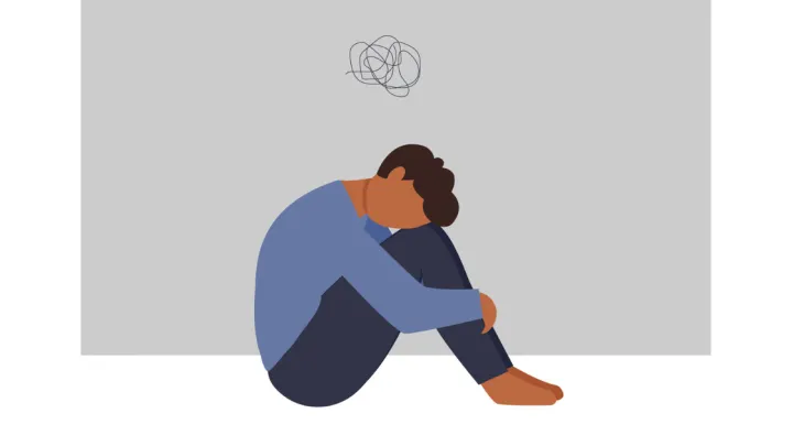 Graphic of sad man sitting on floor
