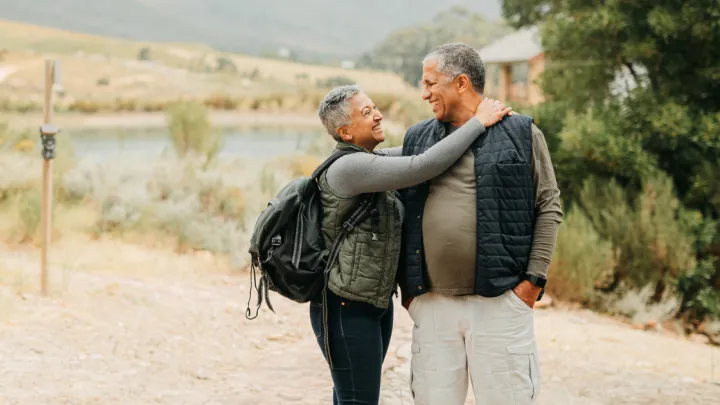Man and woman hugging outside