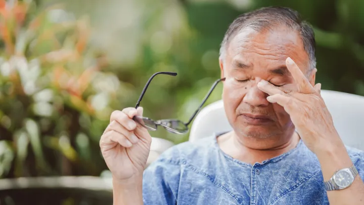 Man rubbing his eyes