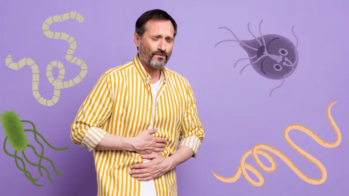 Man holding stomach in pain, surrounded by cartoon parasites