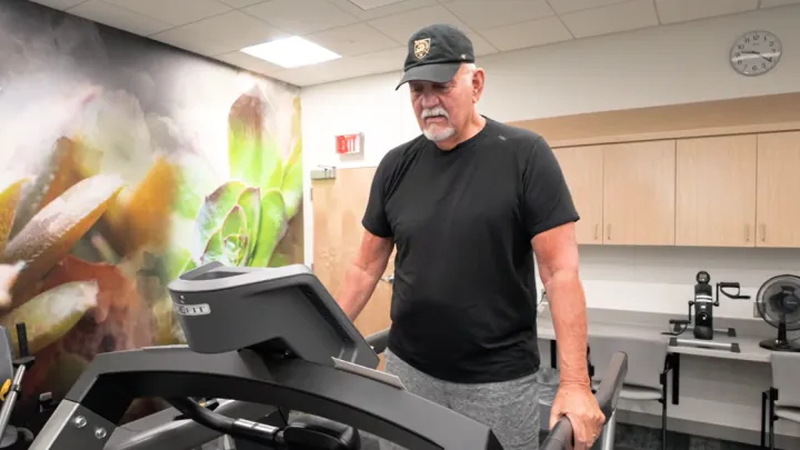 Patient Rich Stanko walking on treadmill in Nebraska Medicine clinic