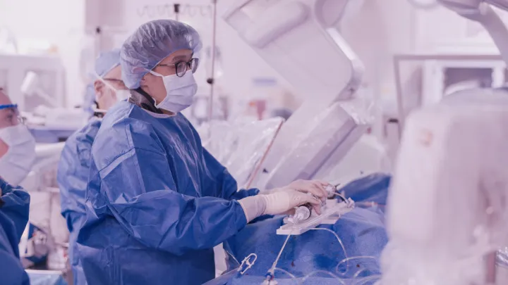 Dr. Eng performing heart surgery