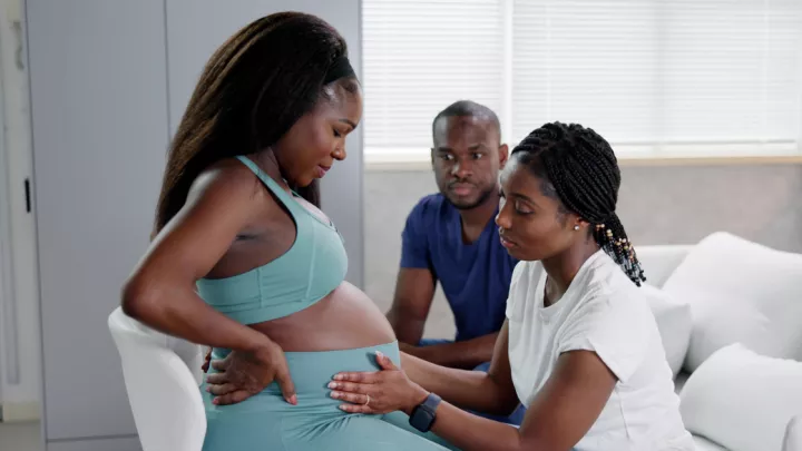 Pregnant woman, husband, and doula