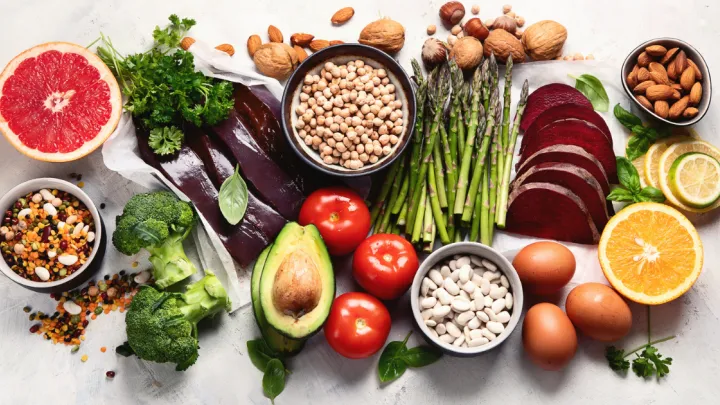 Pile of fruits, vegetables, and legumes high in vitamin B9