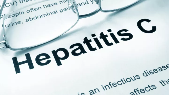 The words "Hepatitis C" printed on paper