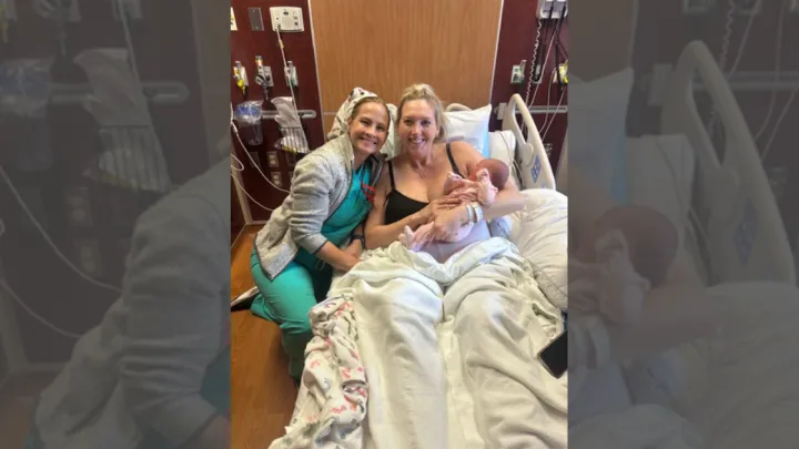 Patient Desireè Parker, daughter Zola, and midwife Kate Scott