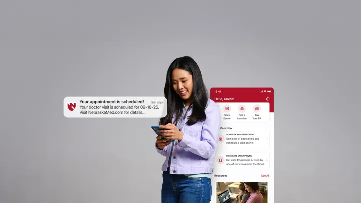 Woman using Nebraska Medicine app