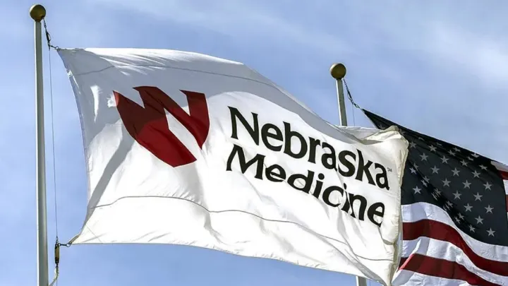 Nebraska Medicine flag and US flag