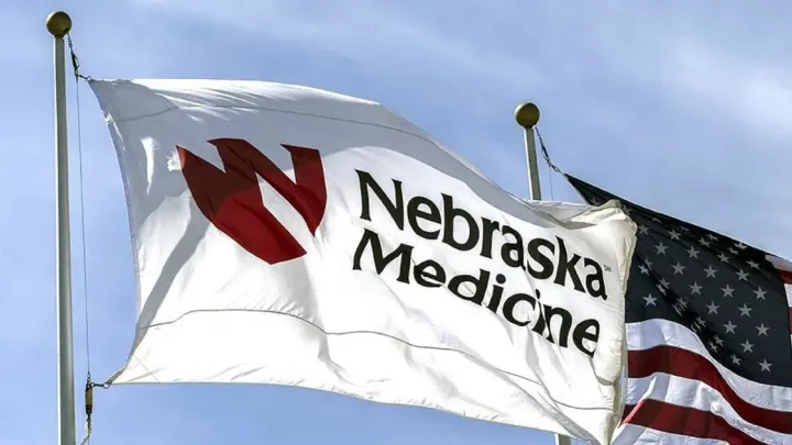 Nebraska Medicine flag and US flag