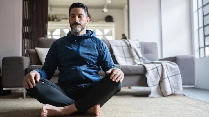 Man sitting, meditating