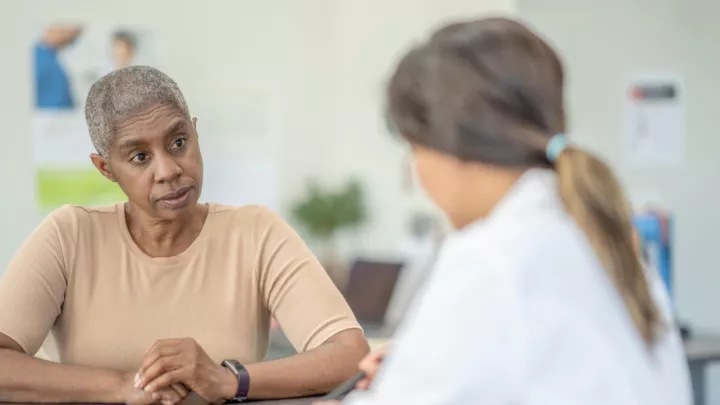 Woman talking to her doctor
