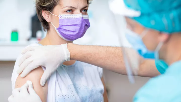 Women receiving vaccine