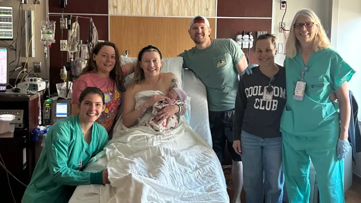 Midwife Alyssa Fischer, daughter Rowyn and her birth support team