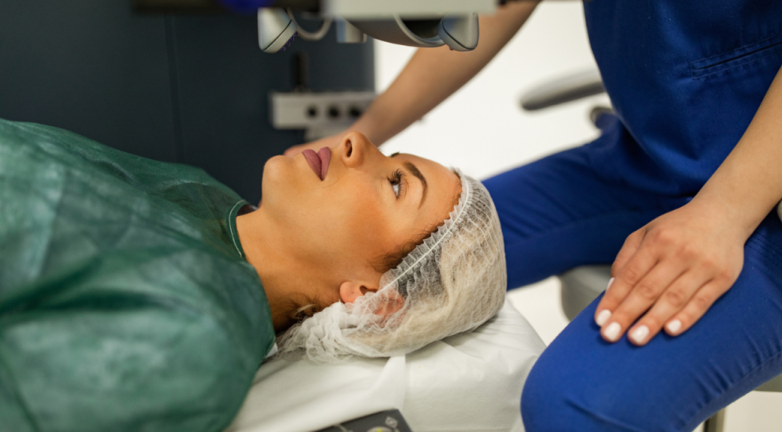 Woman prepared for laser eye surgery