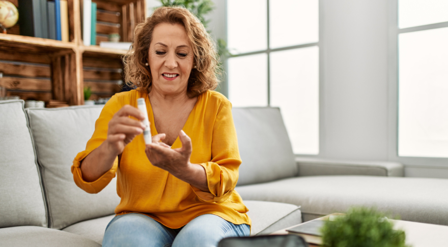 Woman checking blood sugar