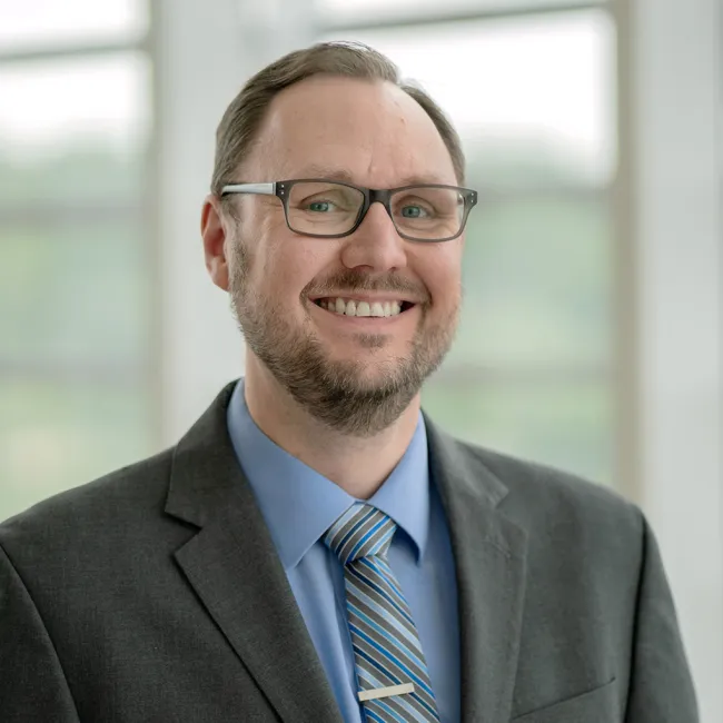   Adam C  Mills, PhD